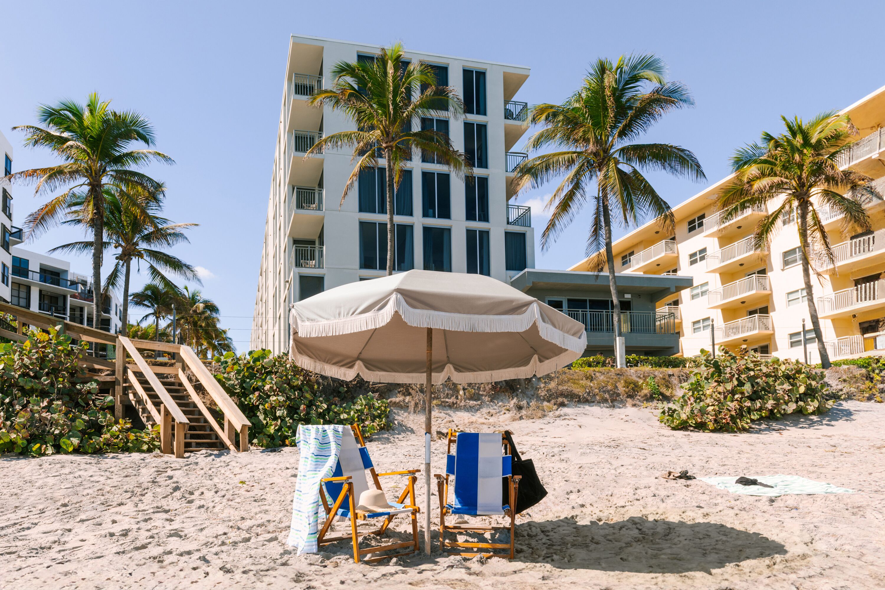 On the beach, sun loungers, beach umbrellas, beach towels