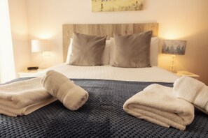 2 dormitorios, tabla de planchar con plancha, wifi gratis y ropa de cama
