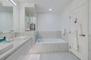 Bathtub, hair dryer, towels