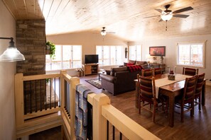 Smart TV, fireplace, table football, books