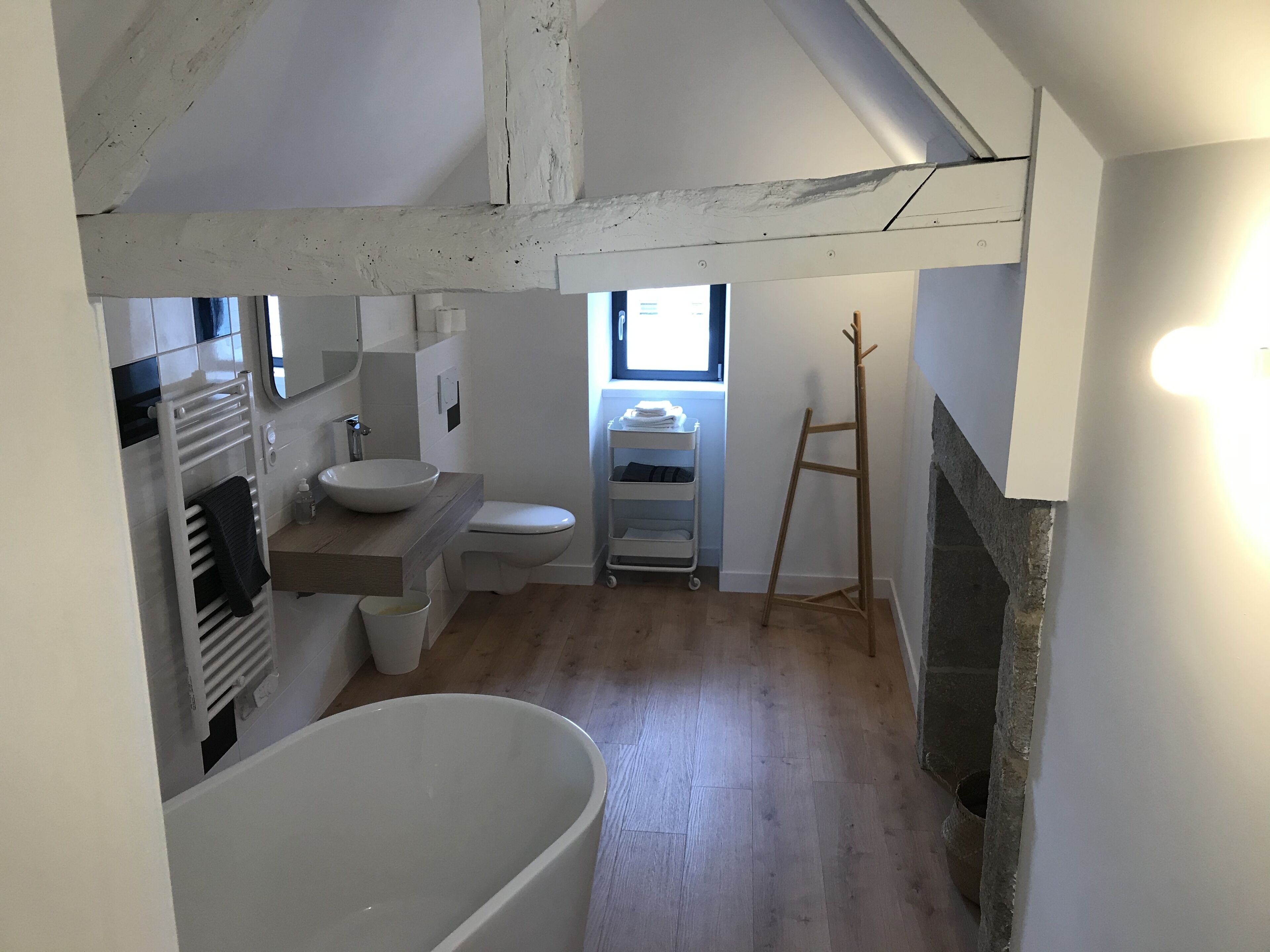 Bathtub, hair dryer, towels, soap