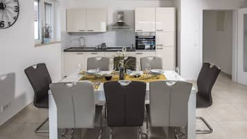 Luxury Villa | Private kitchen | Full-sized fridge, oven, stovetop, dishwasher