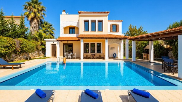 A two-story house with a swimming pool, outdoor furniture, and a pergola. - Ekklisies Tria Large Private Pool, A/C, WiFi (Apokoronos)
