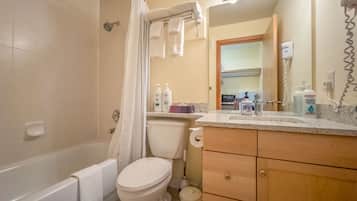 Combined shower/bathtub, hair dryer, towels, soap