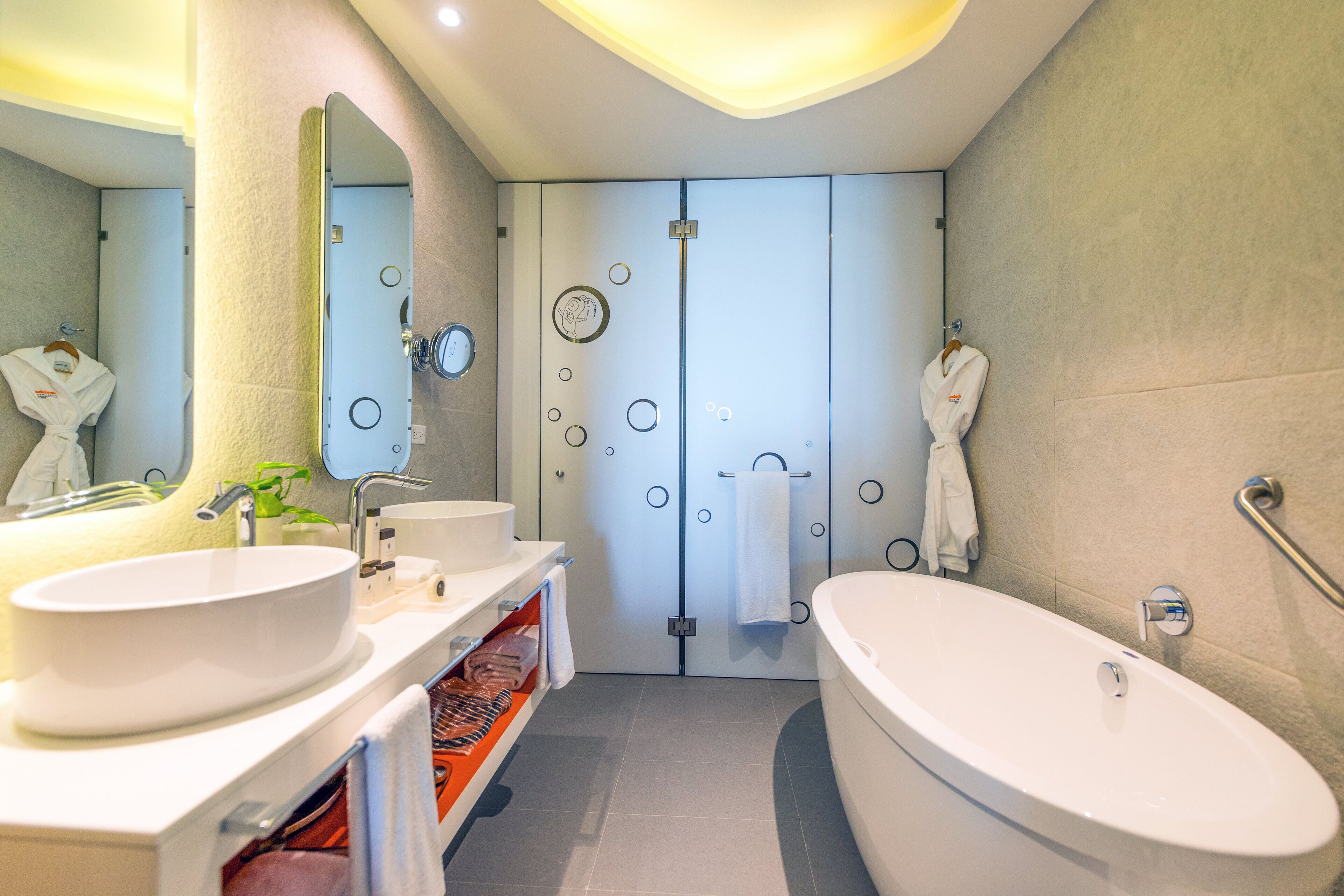 separate bathtub and shower, deep-soaking bathtub, rainfall showerhead