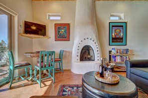 Smart TV, fireplace, books, offices