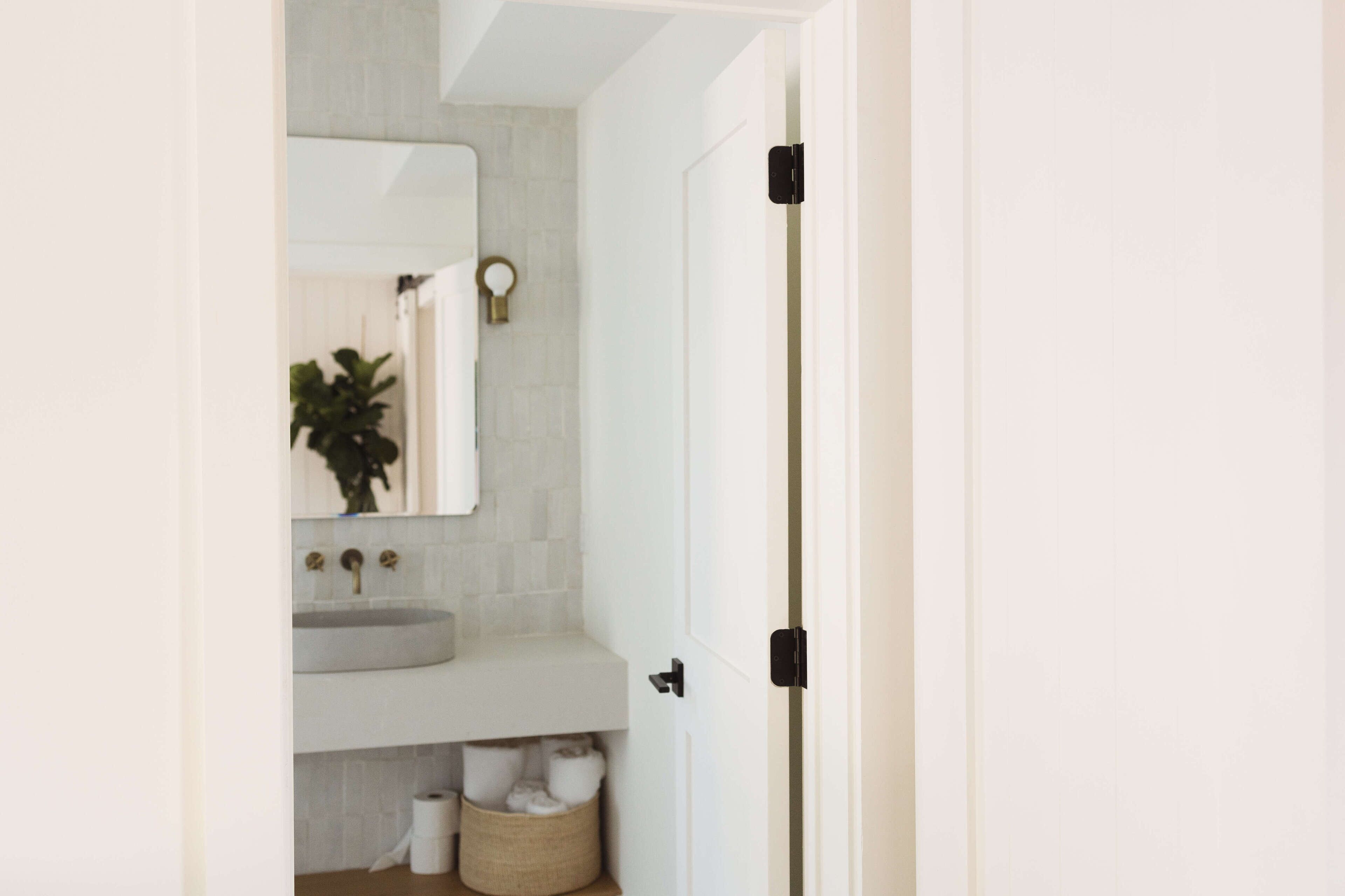 premium studio suite | bathroom | designer toiletries, hair dryer, bathrobes, towels