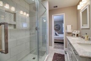 Combined shower/tub, hair dryer, towels, soap
