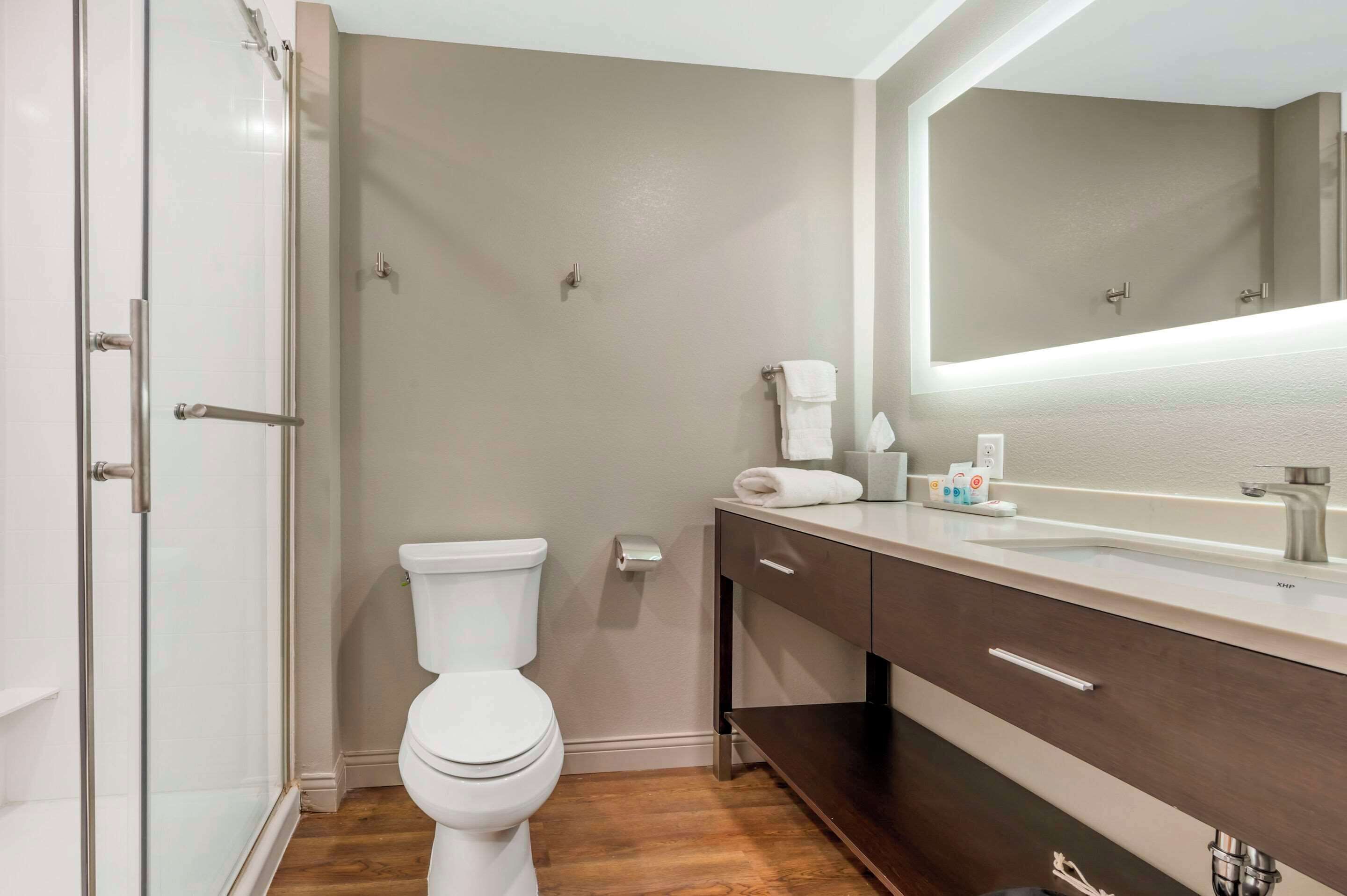 premium bedding, desk, laptop workspace, iron/ironing board