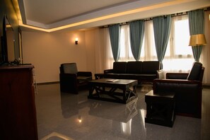 Superior Suite, 1 King Bed, Non Smoking | Desk, free wired internet, bed sheets, wheelchair access