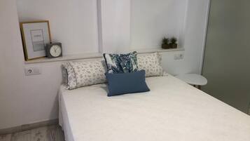 1 dormitorio y ropa de cama