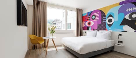 Ylelliset vuodevaatteet, kannettavalle tietokoneelle sopiva työtila