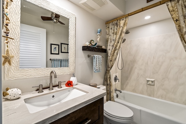 Hair dryer, towels, soap, shampoo