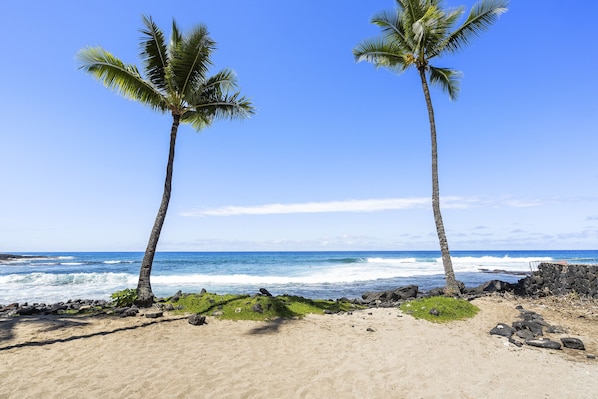 On the beach, sun loungers, beach towels