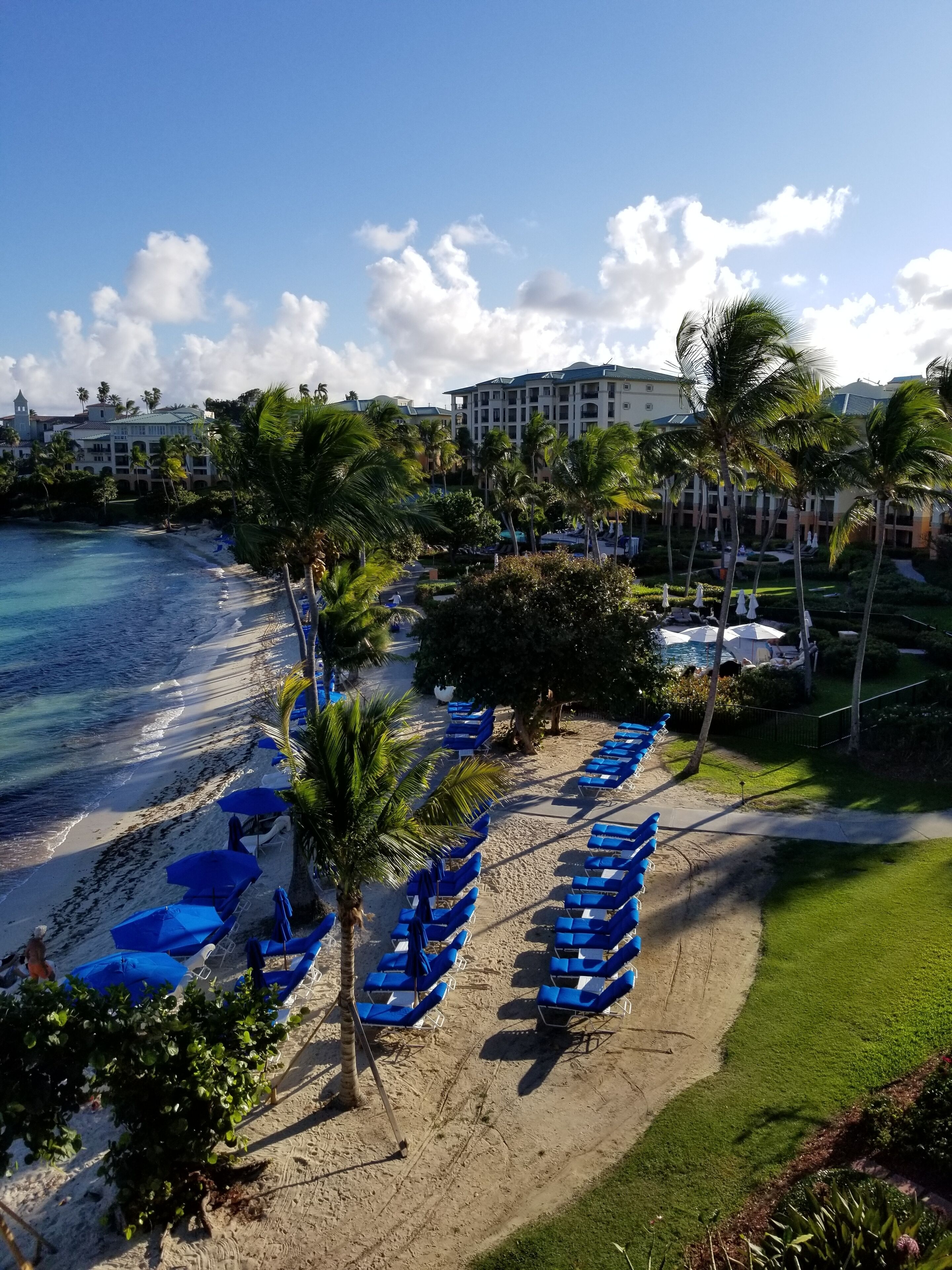 on the beach, sun-loungers, beach towels