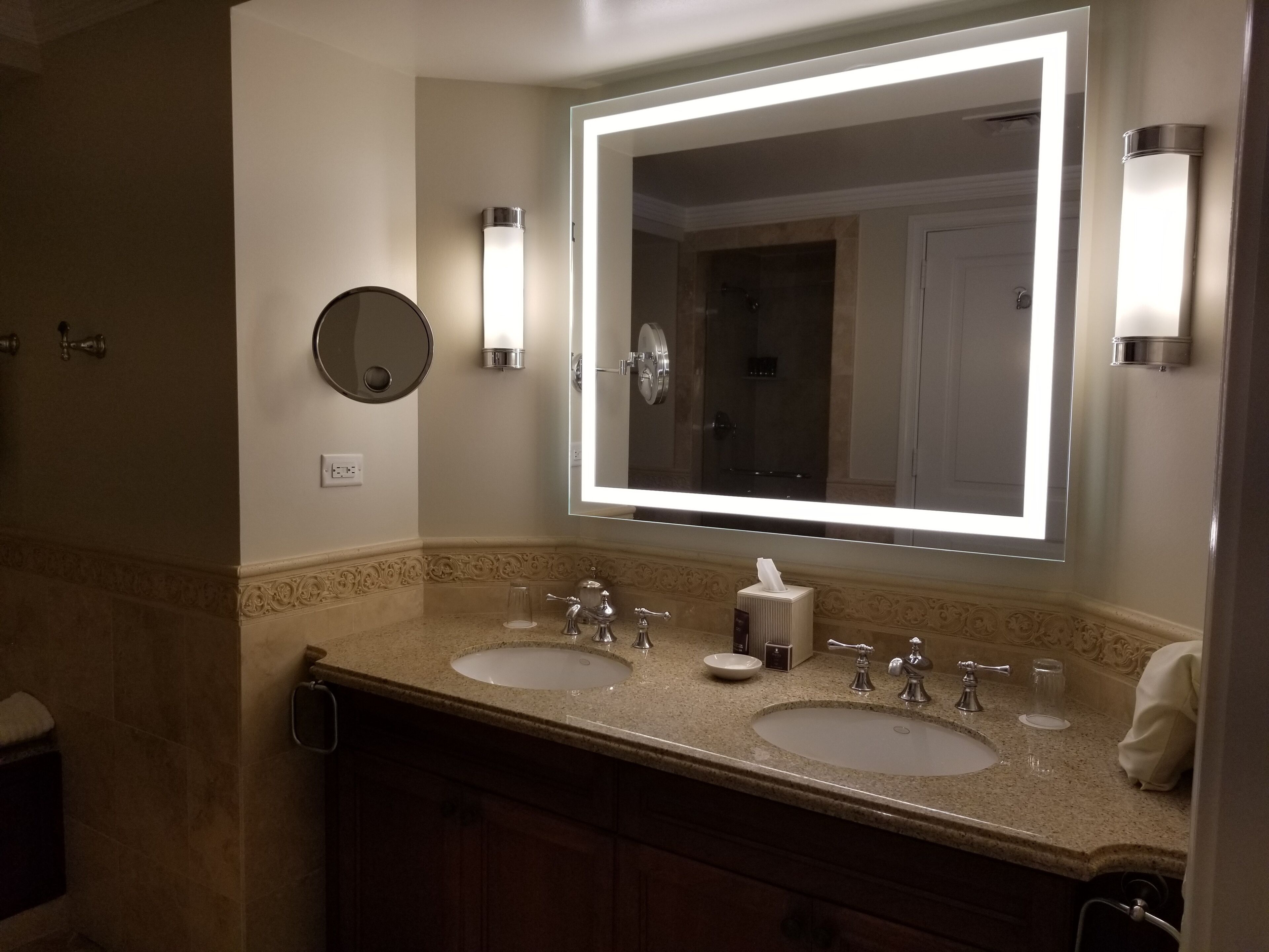 bathtub, hair dryer, towels, soap