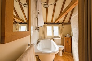 Bathtub, hair dryer, towels