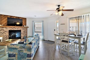 Smart TV, fireplace, books