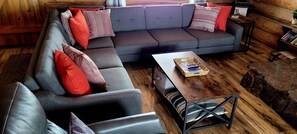 Smart TV, DVD player, foosball, books