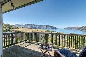 Enjoy a romantic meal on the deck with breathtaking views of the surrounding mountains and water.