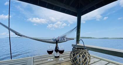 Private intracoastal home with dock and ramp. Dolphins, fish, boat, swim & more