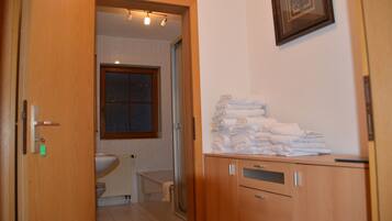 Bathtub, hair dryer, towels