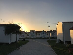 Experience the charm of communal living at URBAN ART Camping, where cozy cabins await.