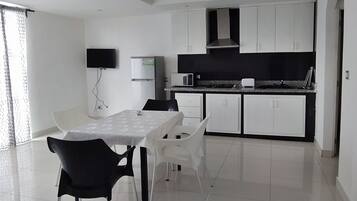 Fridge, microwave, stovetop, cookware/dishes/utensils