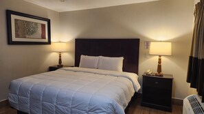 Single Room, 1 King Bed, Non Smoking | Down comforters, individually decorated, individually furnished, desk - CLEAR LAKES INN (Quitman)