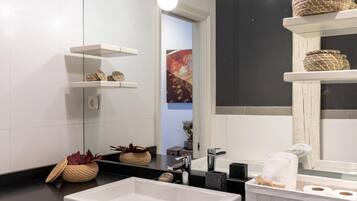 Shower, eco-friendly toiletries, hair dryer, towels