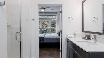 Combined shower/tub, hair dryer, towels, soap