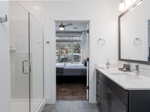 Combined shower/tub, hair dryer, towels, soap