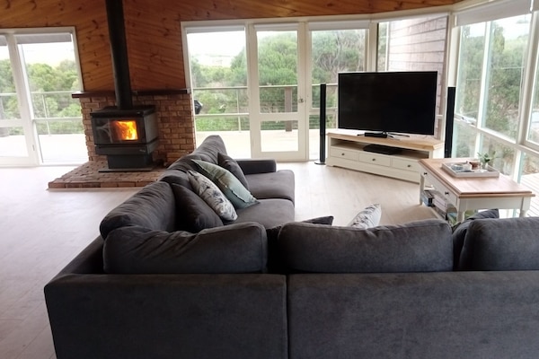 Upstairs living with wood burning heater