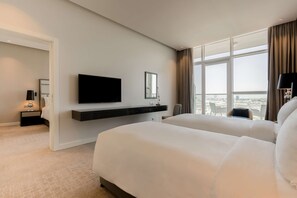 Family Room | Premium bedding, down comforters, minibar, in-room safe - Radisson Dubai Damac Hills (Dubai)
