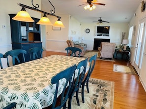 A dining area with a table, chairs, and a ceiling fan. - Holden' A Full House 4 Bedroom Home by RedAwning (Supply)