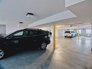 Park your vehicle in this well-lit, functional garage with ample parking spaces.