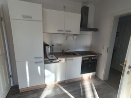 Standard Condo | Private kitchen | Fridge, oven, stovetop, electric kettle