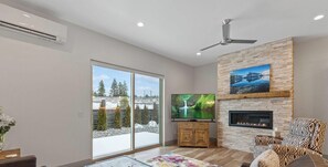 Smart TV, fireplace, books