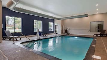 Indoor pool, open 10:00 AM to 10:00 PM, pool loungers