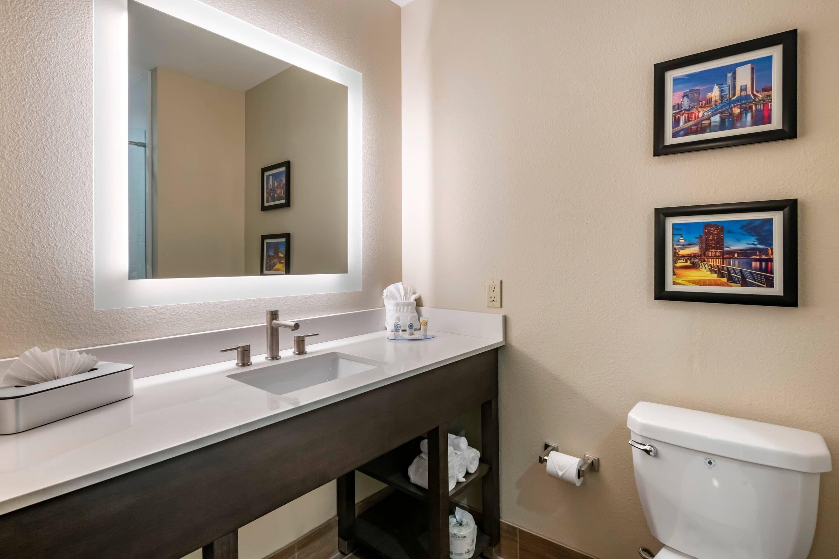 Premium bedding, pillow-top beds, desk, laptop workspace