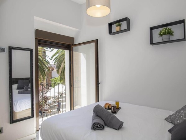 2 bedrooms, desk, iron/ironing board, travel crib