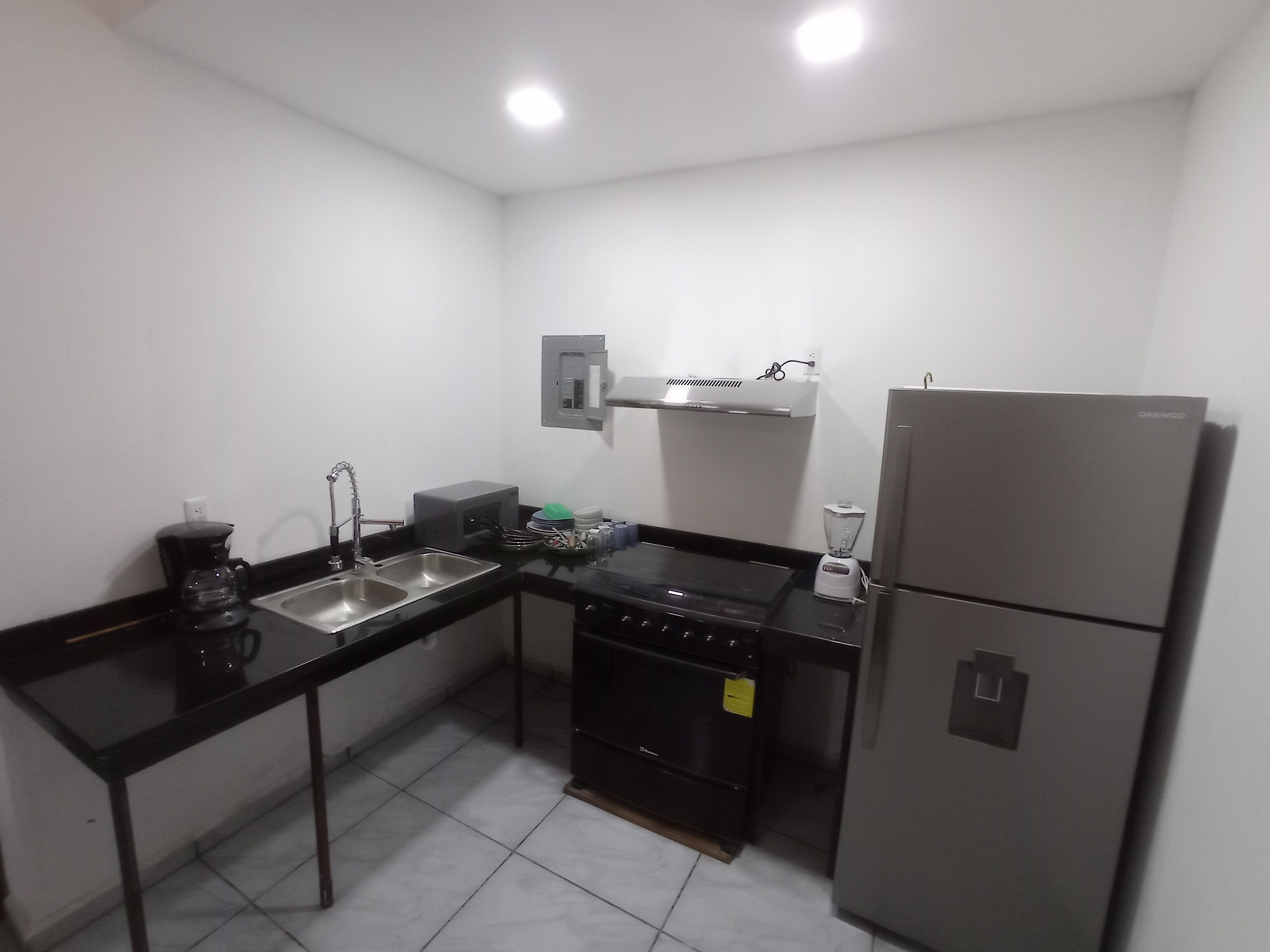 Fridge, stovetop, coffee/tea maker, toaster