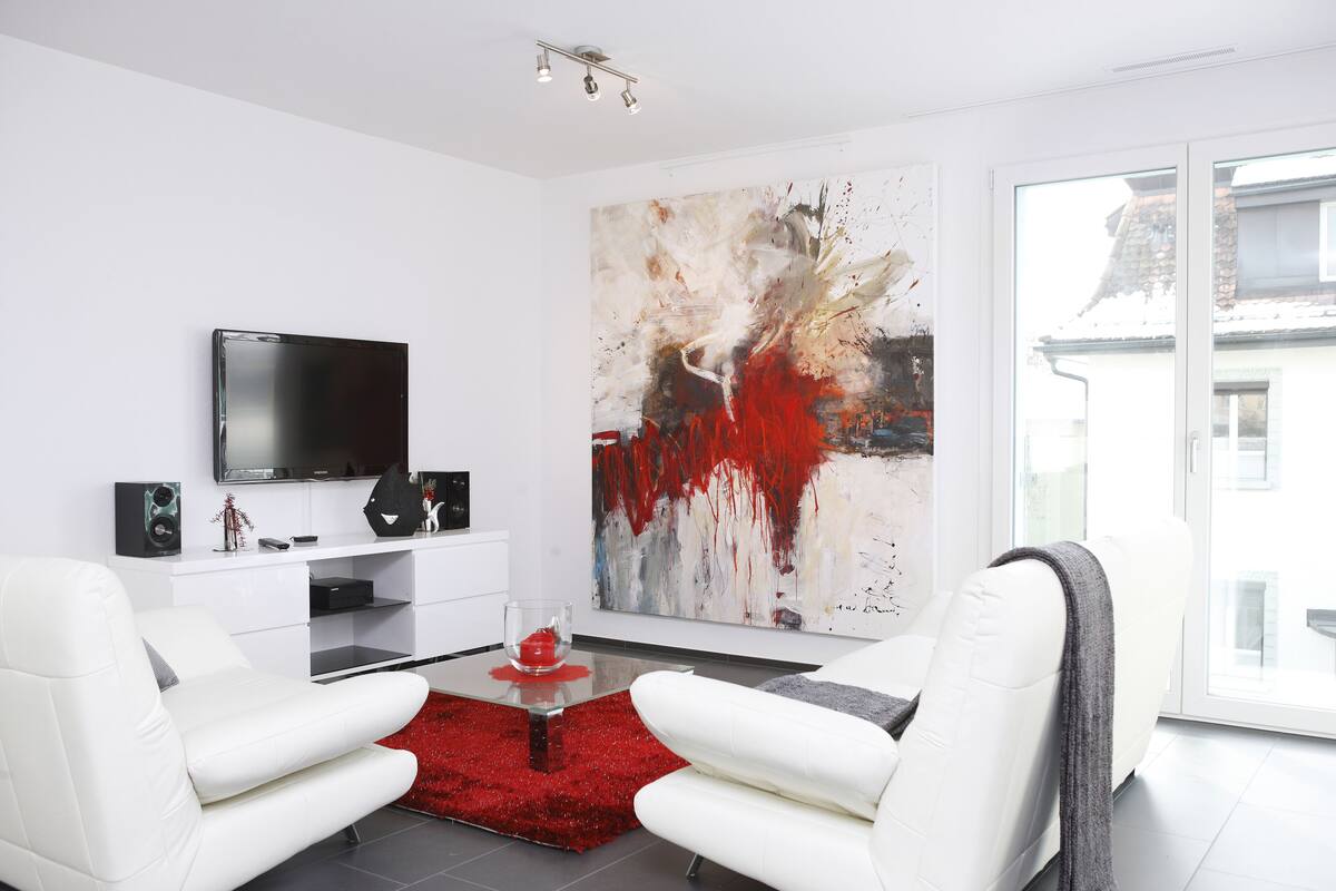 Leilighet | Oppholdsområde | En 40-tommers Flatskjerm-TV med kabel-kanaler samt TV og DVD-spiller