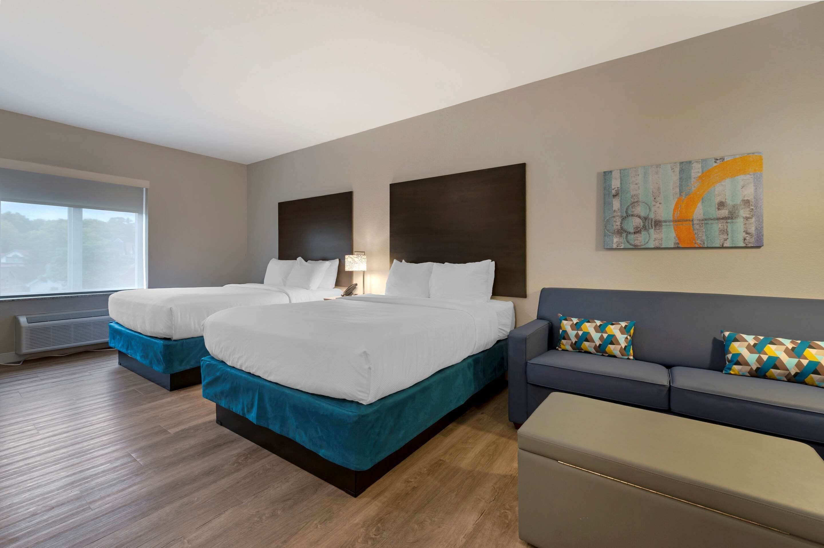 desk, laptop workspace, blackout curtains, iron/ironing board