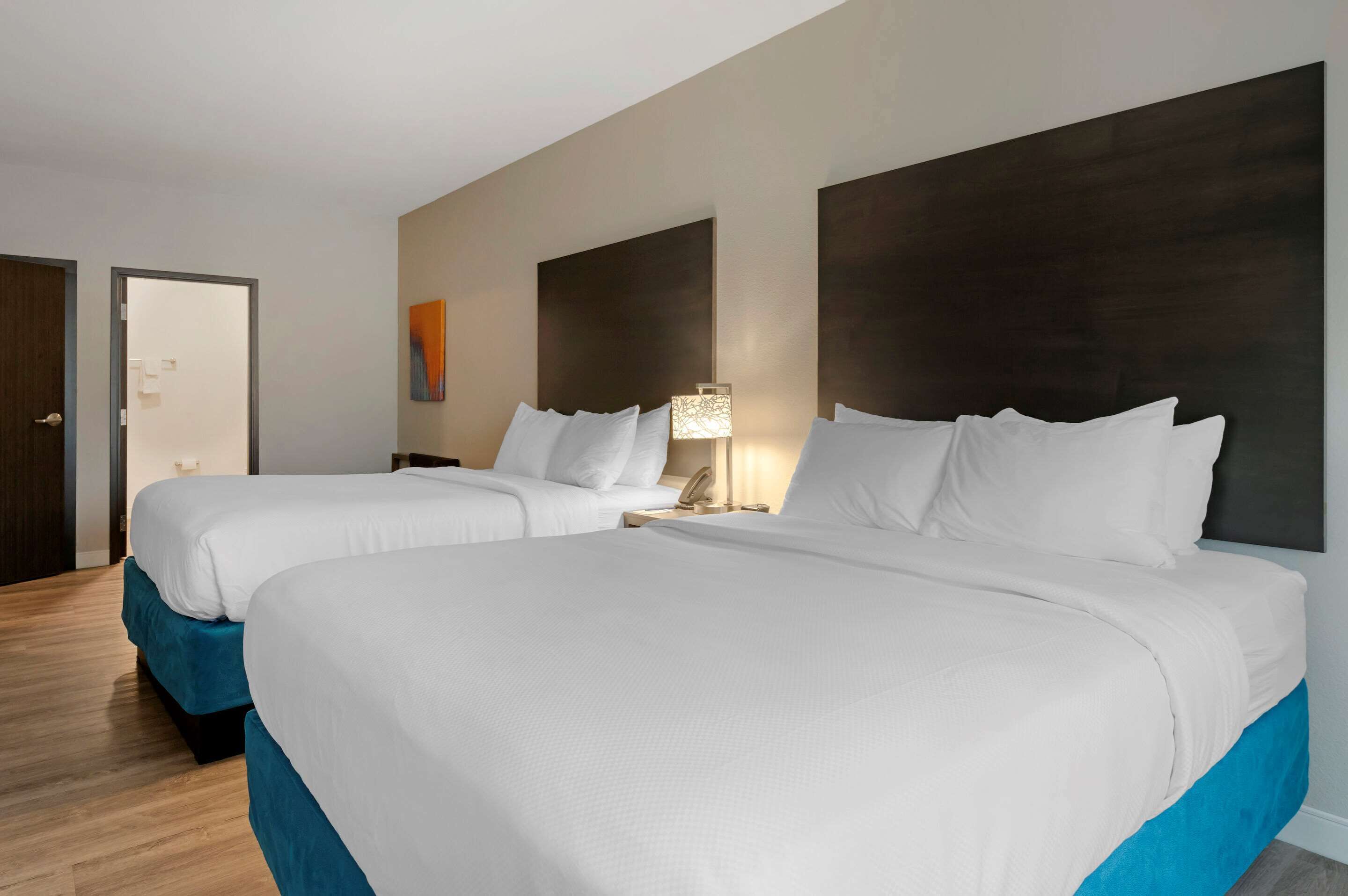 desk, laptop workspace, blackout curtains, iron/ironing board