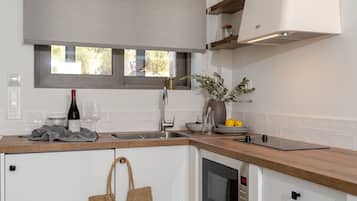 Deluxe-svíta - sjávarsýn | Einkaeldhús | Míní-ísskápur, eldavélarhellur, rafmagnsketill