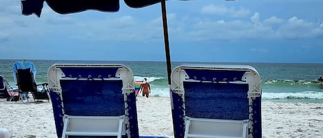 On the beach, sun loungers