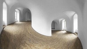 A spacious interior with high ceilings and arched windows. - 175sqm High-end Luxury Apartment - Heart of CPH (Copenhagen)
