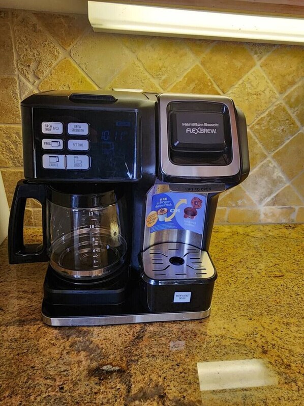 A Hamilton Beach Flexbrew coffee maker with a digital display, a drip tray, and a single-serve pod compartment. - Beautiful By the Beach/King bed/AC/2 car garage (San Diego)