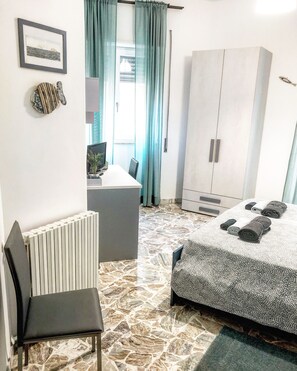 4 bedrooms, desk, iron/ironing board, travel cot
